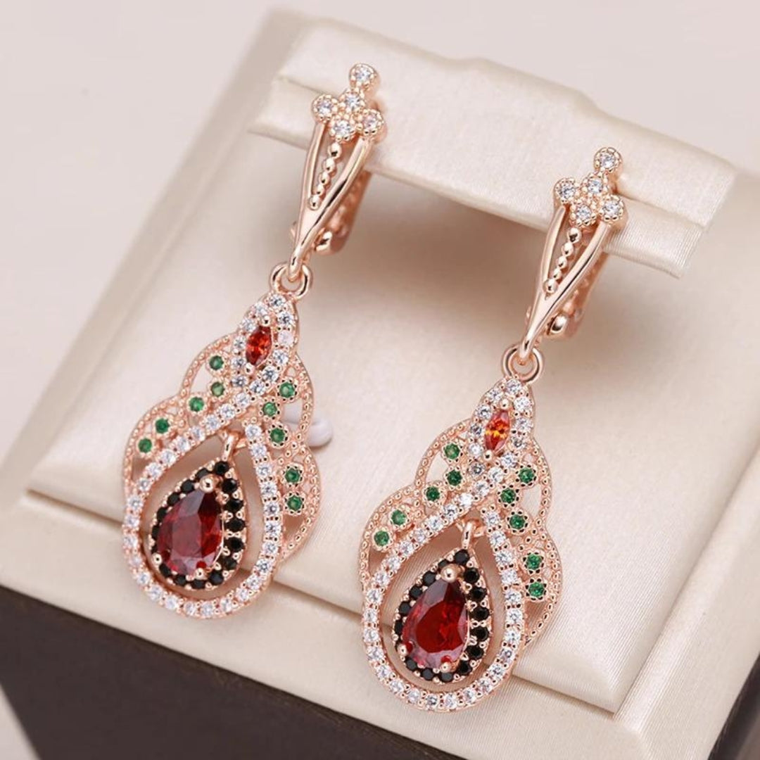 Boucles d'oreilles Mandala rouges avec zirconia en or