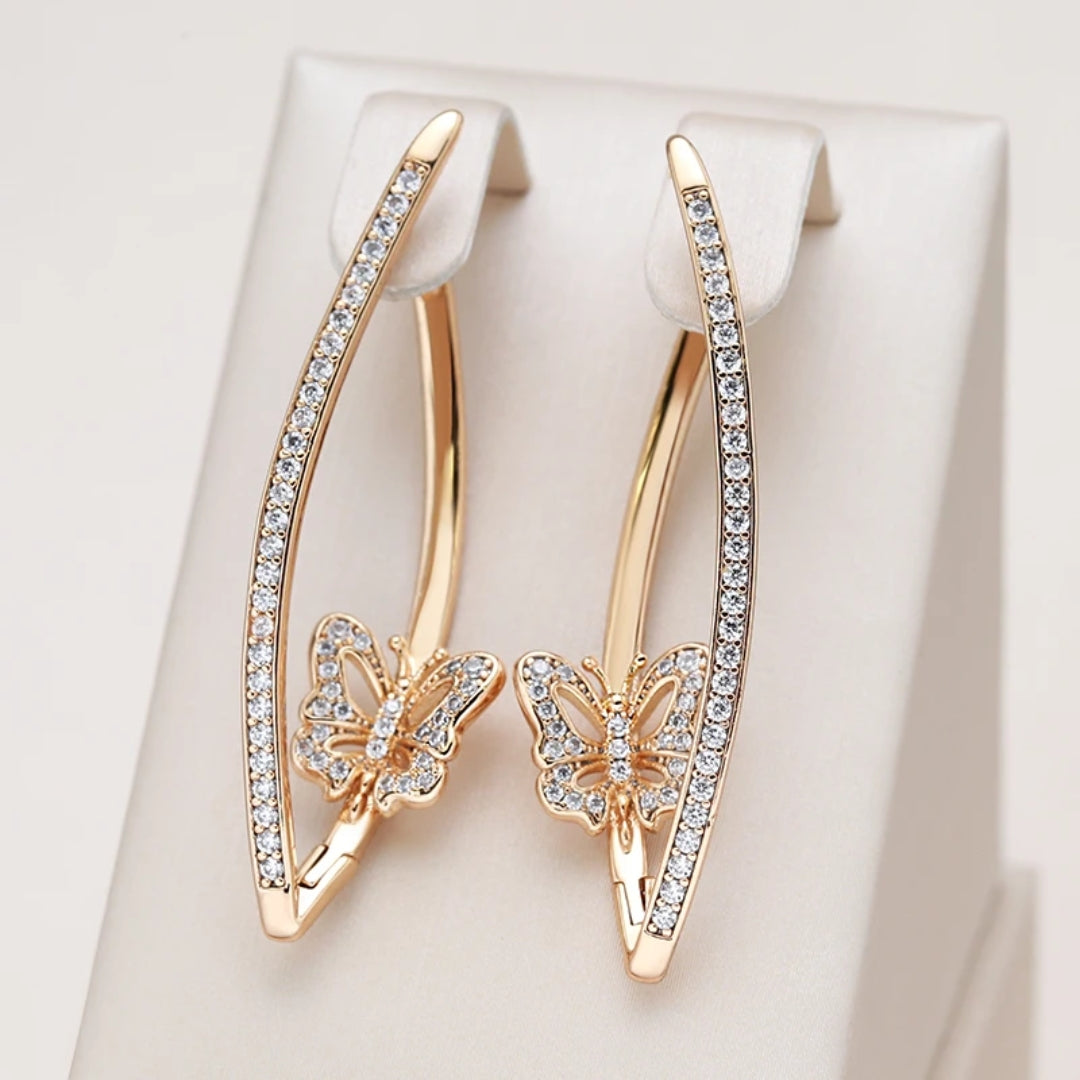 Boucles d'oreilles élégantes en forme de papillon avec des paillettes