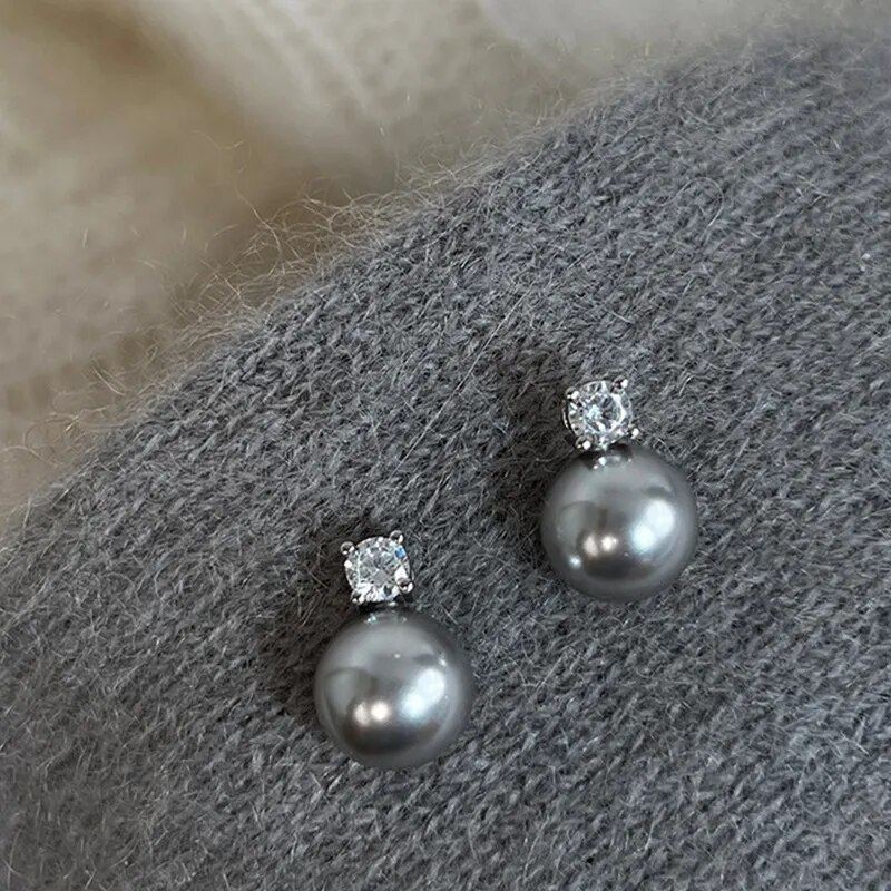 Boucles d'oreilles élégantes en perles noires et zircon
