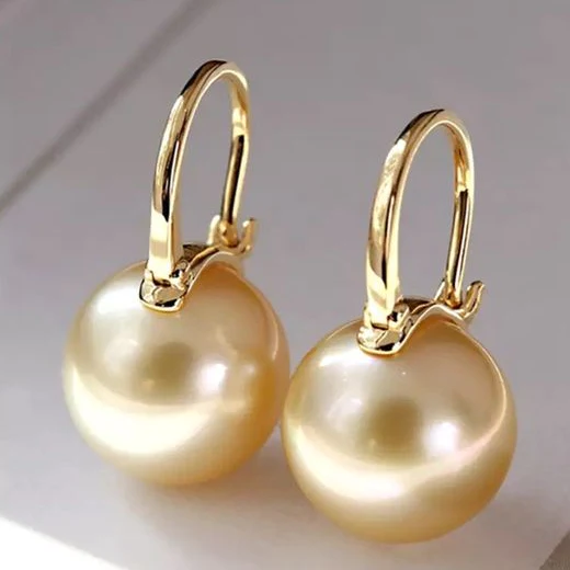 Boucles d'oreilles en perles dorées élégantes