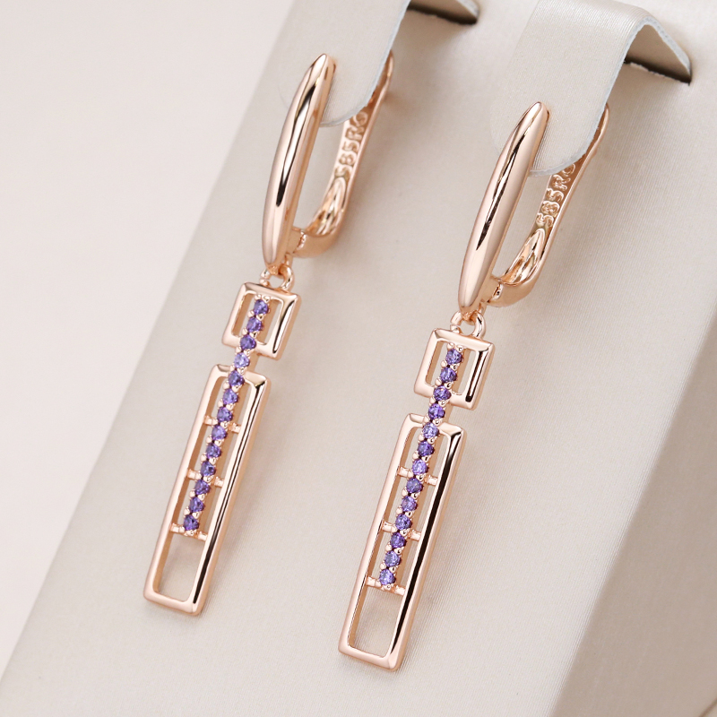 Boucles d'oreilles rectangulaires élégantes avec des cristaux violets en or