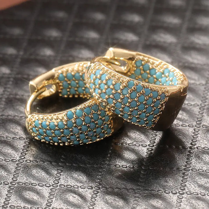 Boucles d'oreilles créoles en turquoise et ton doré