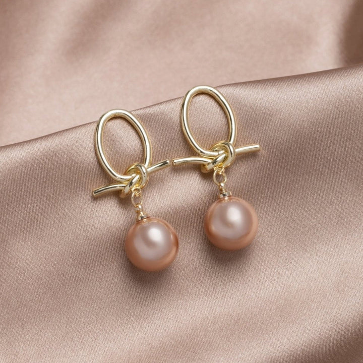 Boucles d'oreilles en perles dorées