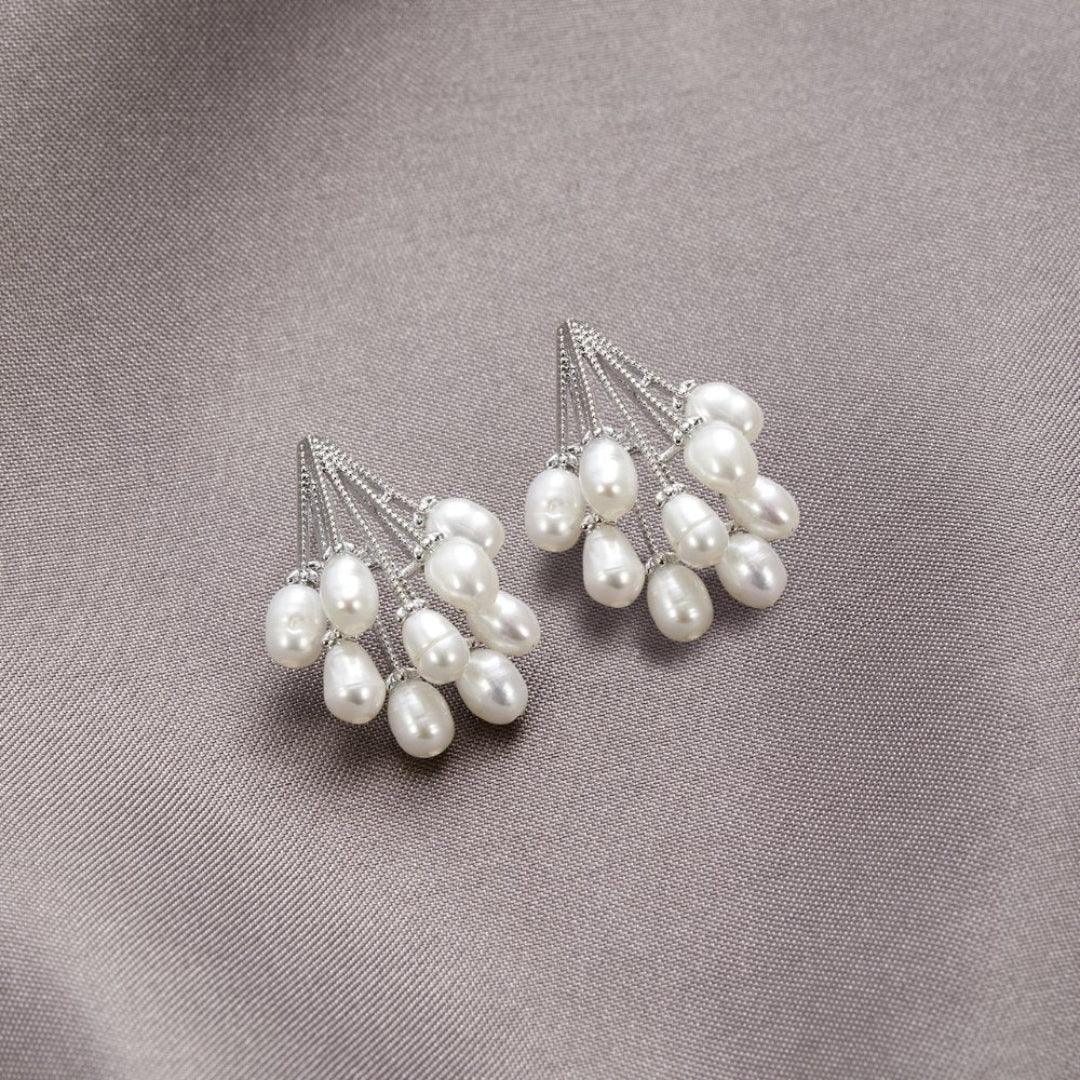 Boucles d'oreilles en corail avec des perles d'eau douce