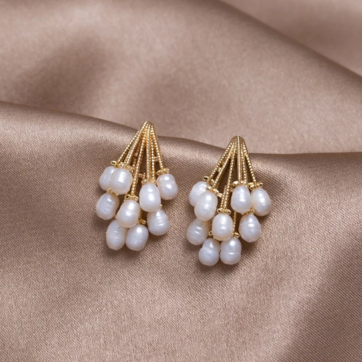 Boucles d'oreilles en corail avec des perles d'eau douce