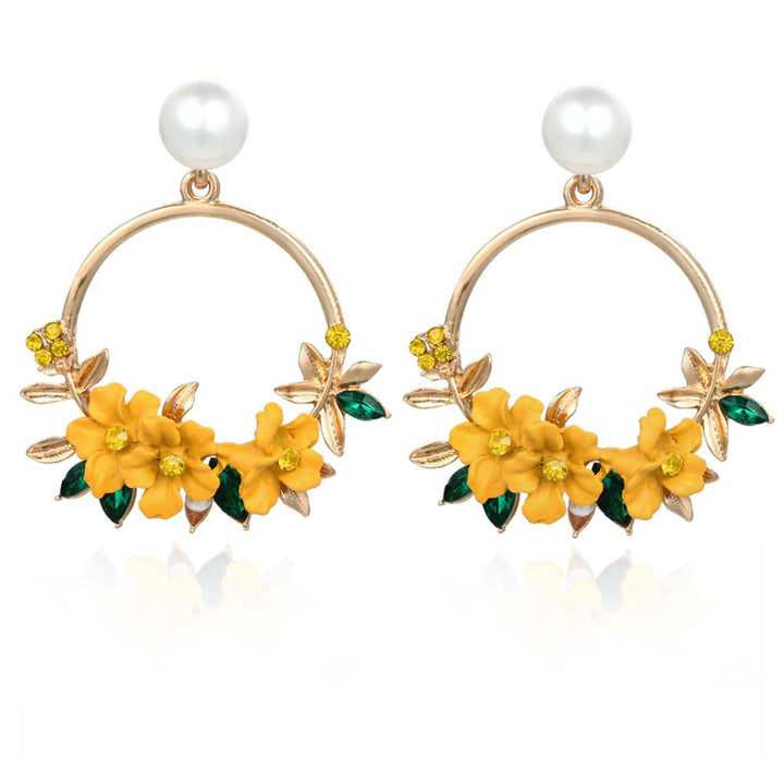 Boucles d'oreilles en fleurs et perles dorées