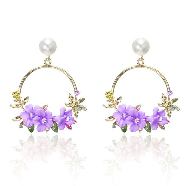 Boucles d'oreilles en fleurs et perles dorées
