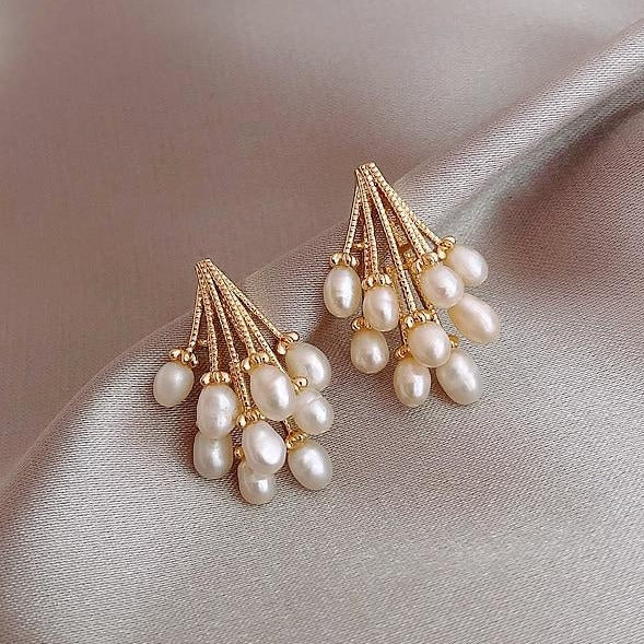 Boucles d'oreilles en corail avec des perles d'eau douce