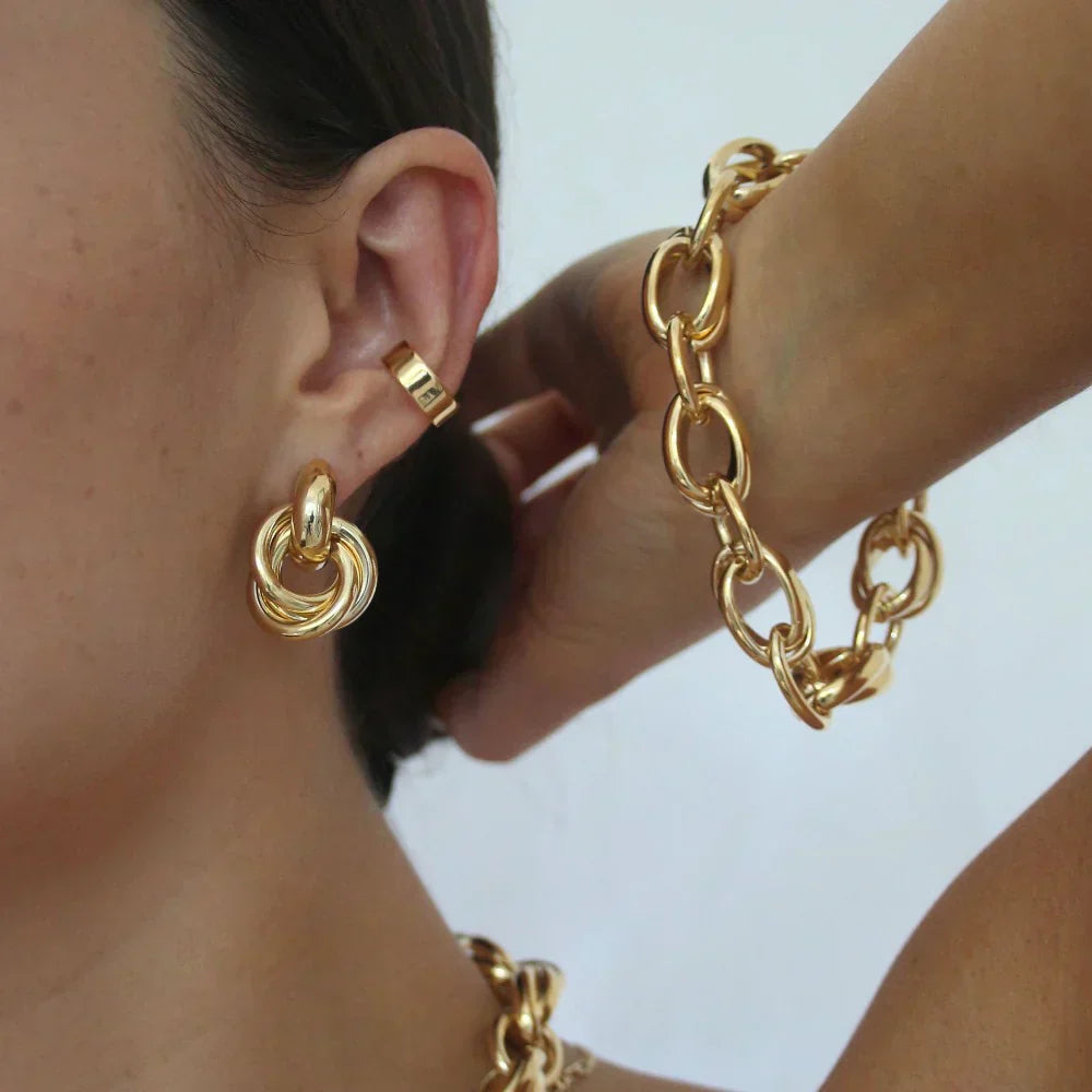 Boucles d'oreilles entrelacées Utsagda