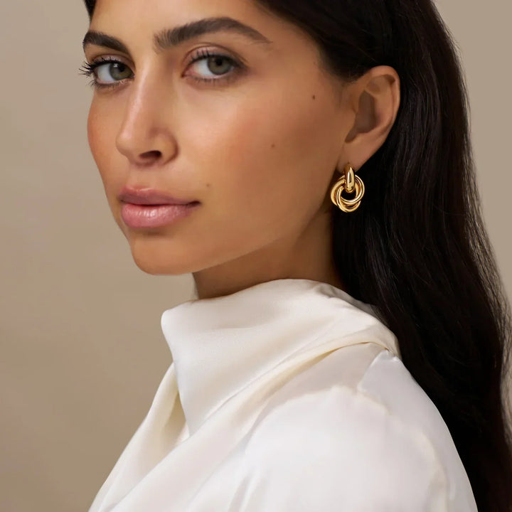 Boucles d'oreilles entrelacées Utsagda