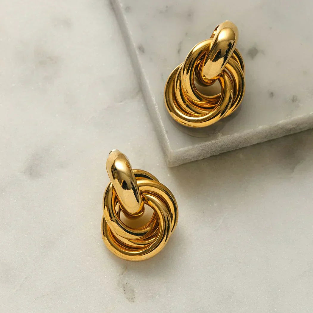 Boucles d'oreilles entrelacées Utsagda