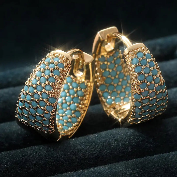Boucles d'oreilles créoles en turquoise et ton doré