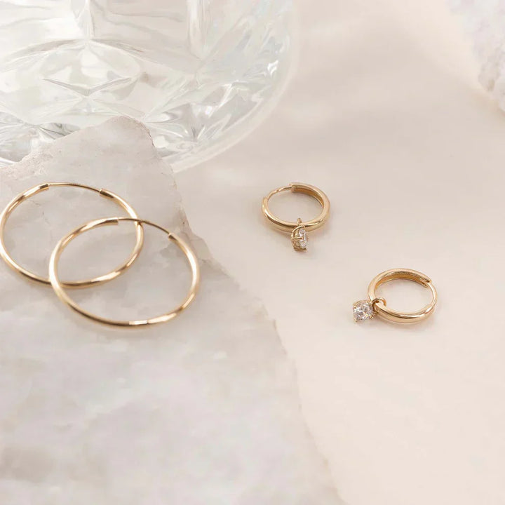 Boucles d'oreilles créoles en pierre de lune